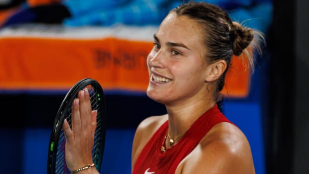 Tennis star Aryna Sabalenka celebrates winning a match at the 2024 Australian Open.